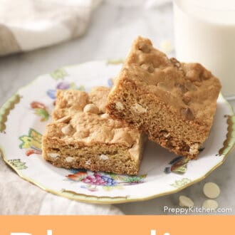Pinterest graphic of two blondies on a porcelain plate.