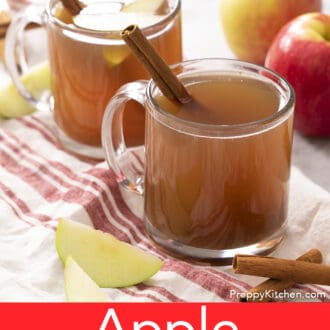 Pinterest graphic of two glass mugs of apple cider next to an apple.