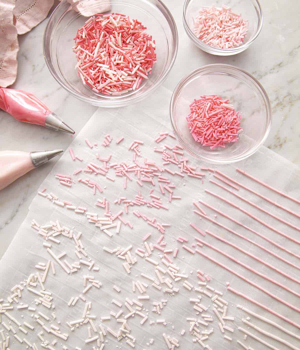 Homemade sprinkles in various glass bowls.