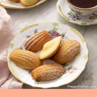 Pinterest graphic of five Madeleines on a plate with a signature hump on the back.