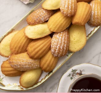 Pinterest graphic of a top down view of madeleines on a tray.