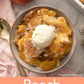 Pinterest graphic of a bowl of peach cobbler next to a fresh peach.