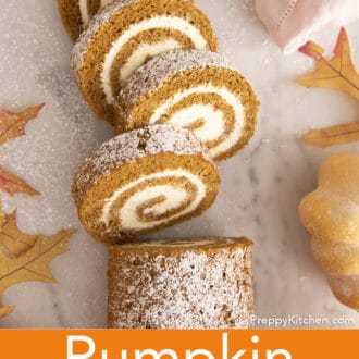 Pinterest graphic of pieces of pumpkin roll cake on a marble table.
