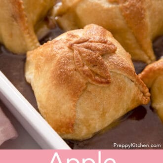 Pinterest graphic of apple dumplings in a white baking dish.