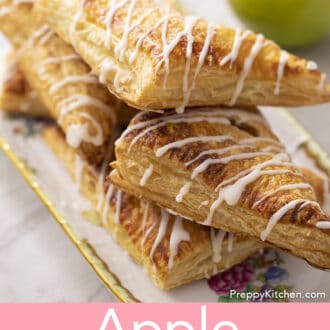 Pinterest graphic of apple turnovers on a serving plate.