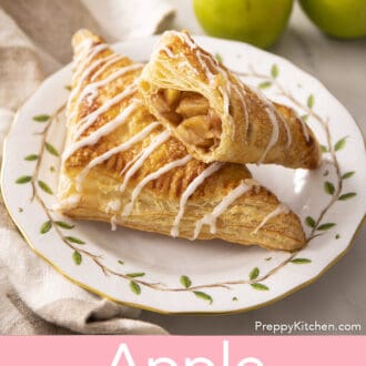 Pinterest graphic of two apple turnovers on a plate with one having a bite taken out.