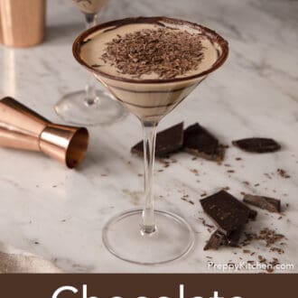 Pinterest graphic of a chocolate martini next to a copper jigger and broken pieces of chocolate.