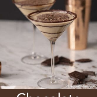 Pinterest graphic of two chocolate martinis with a swirls of chocolate syrup next to a cocktail shaker.