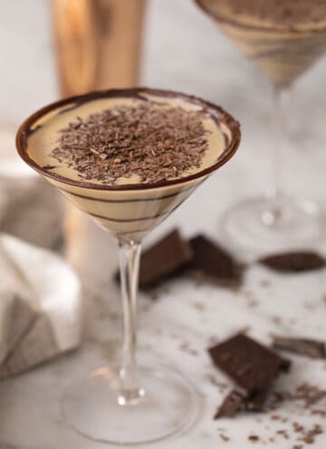 A chocolatini topped with shaved chocolate.
