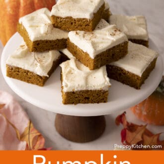 Pinterest graphic of a group of pumpkin bars on a cake stand.