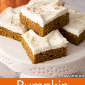 Pinterest graphic of five pumpkin bars on a small cake stand.