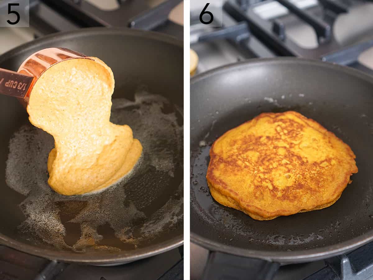 Pumpkin pancakes cooking in a nonstick pan.