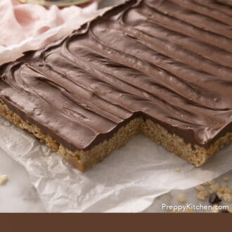 Pinterest graphic of a rectangle of scotcheroos with one piece missing.