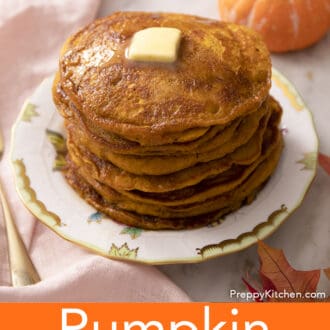 A stack of many pumpkin pancakes on a white plate.