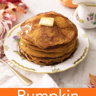 A stack of pumpkin pancakes on a porcelain plate.