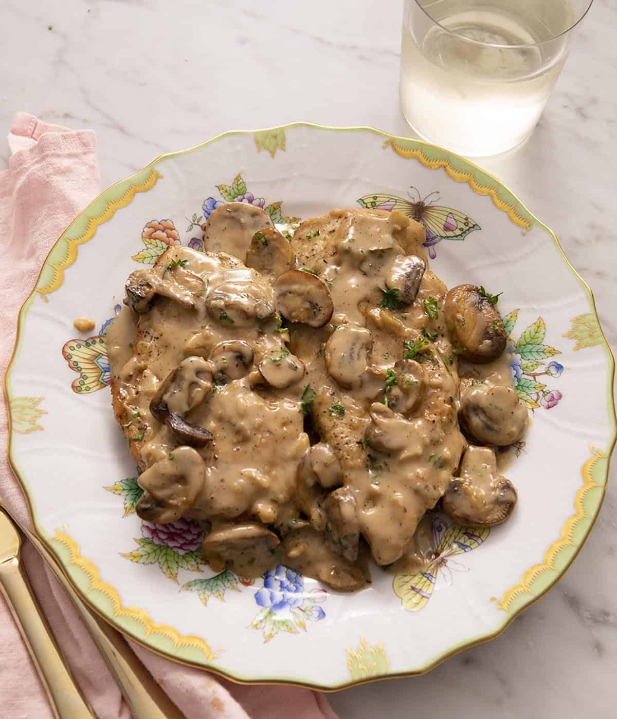 Chicken Marsala with mushrooms on a plate.