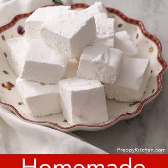 Pinterest graphic of several square marshmallows stacked on a festive platter.