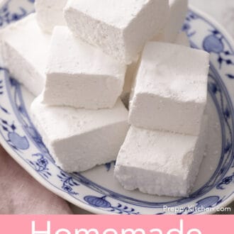 Pinterest graphic of homemade marshmallows stacked on a blue and white platter.