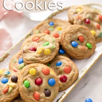 Pinterest graphic of several M&M Cookies on a serving tray.