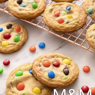 Pinterest graphic of M&M Cookies on a wire cooling rack
