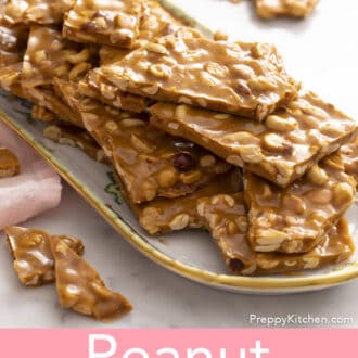 Pinterest graphic of pieces of peanut brittle stacked on a porcelain serving tray.