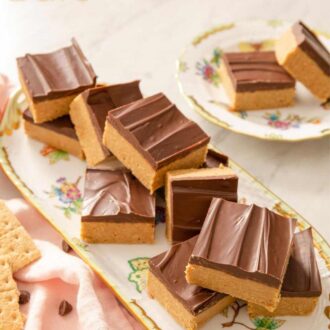 A Pinterest graphic showing a long platter of peanut butter dessert bars.