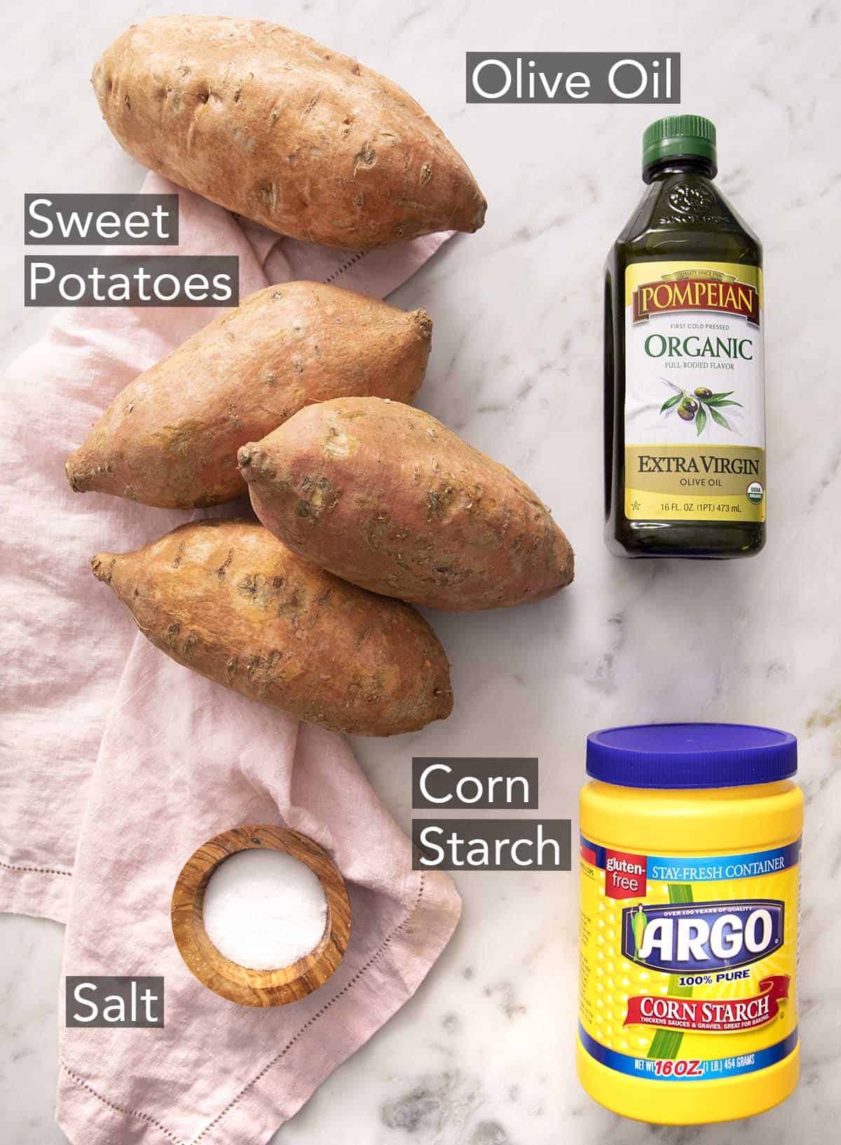 Ingredients for making sweet potato fries on a counter.