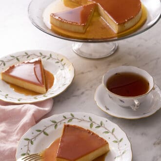 Pinterest graphic of a flan on a white plate with a fork and a white marble counter.