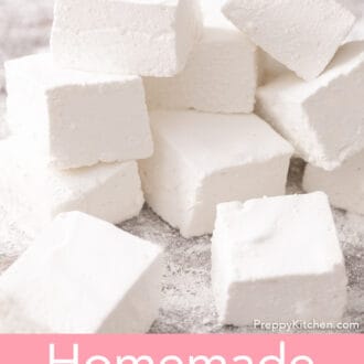 Pinterest graphic of several cubed marshmallows stacked on a cutting board.