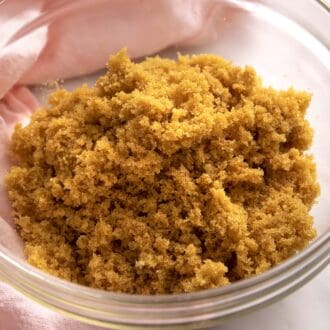 A glass bowl filled with homemade brown sugar.