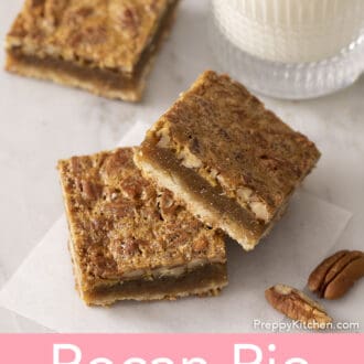 Pinterest graphic of 3 pecan pie bars stacked on a white marble counter.