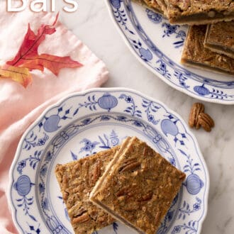 Pinterest graphic of pecan pie bars stacked on a blue and white plate.