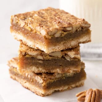A stack of three pecan pie bars.