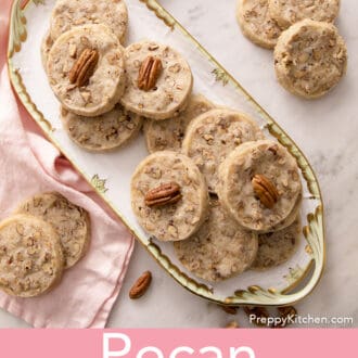 pecan sandies stacked on a serving tray