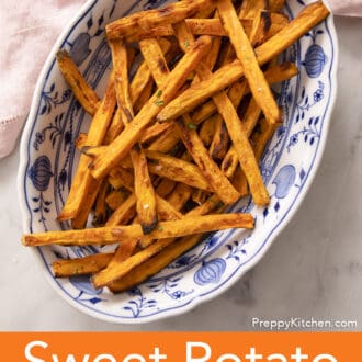 sweet potato fries on a blue and white platter