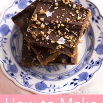 3 pieces of toffee stacked on a blue and white plate