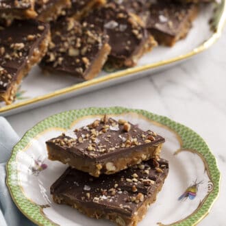 2 pieces of toffee on a porcelain plate