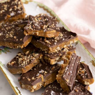 several pieces of toffee on a porcelain serving tray