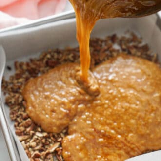 toffee mixture being poured into a square pan