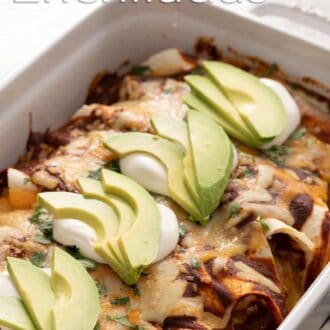 Pinterest graphic showing homemade enchiladas with toppings in a baking dish.