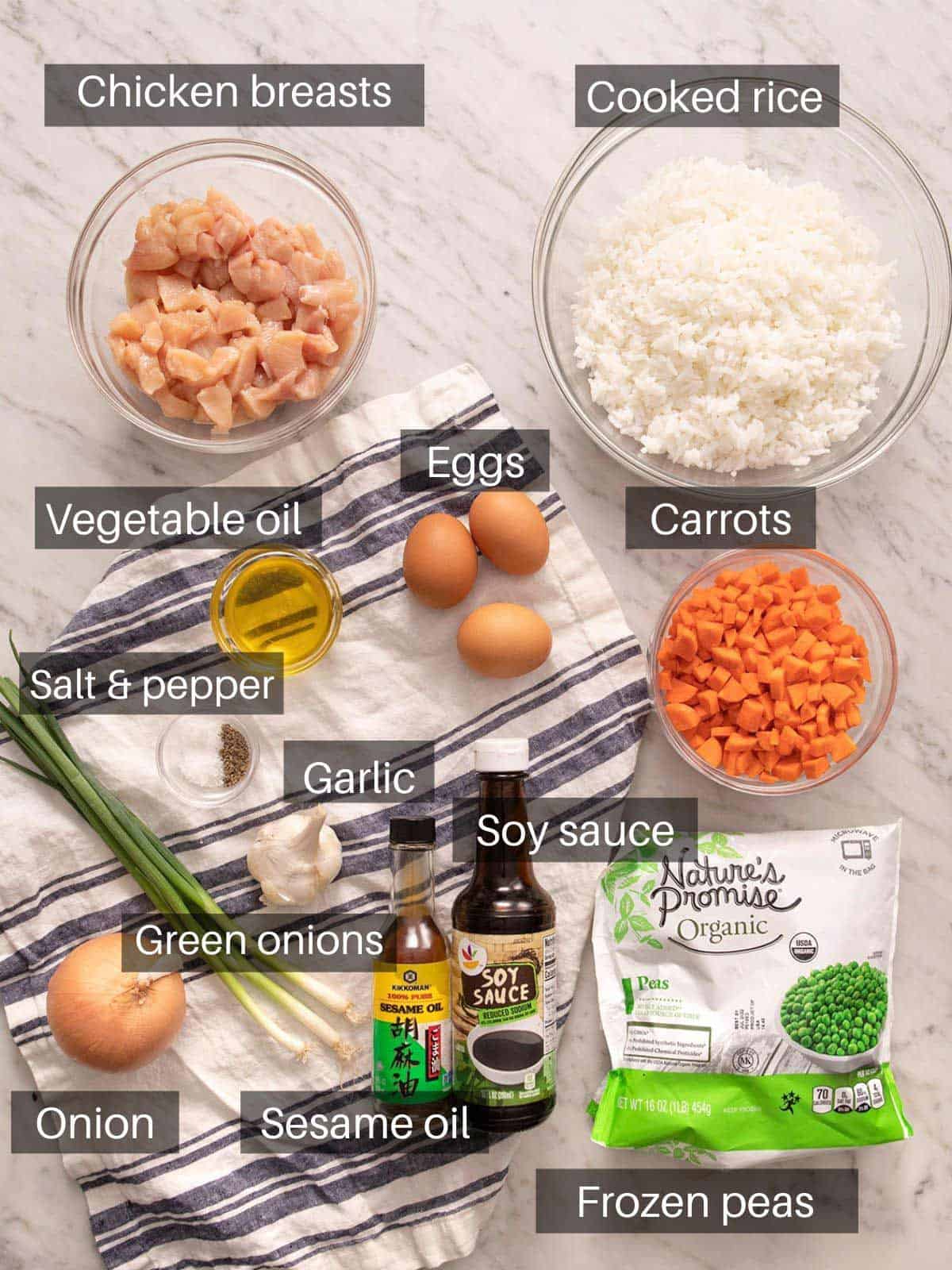 An overhead shot of all the ingredients you need to make chicken fried rice