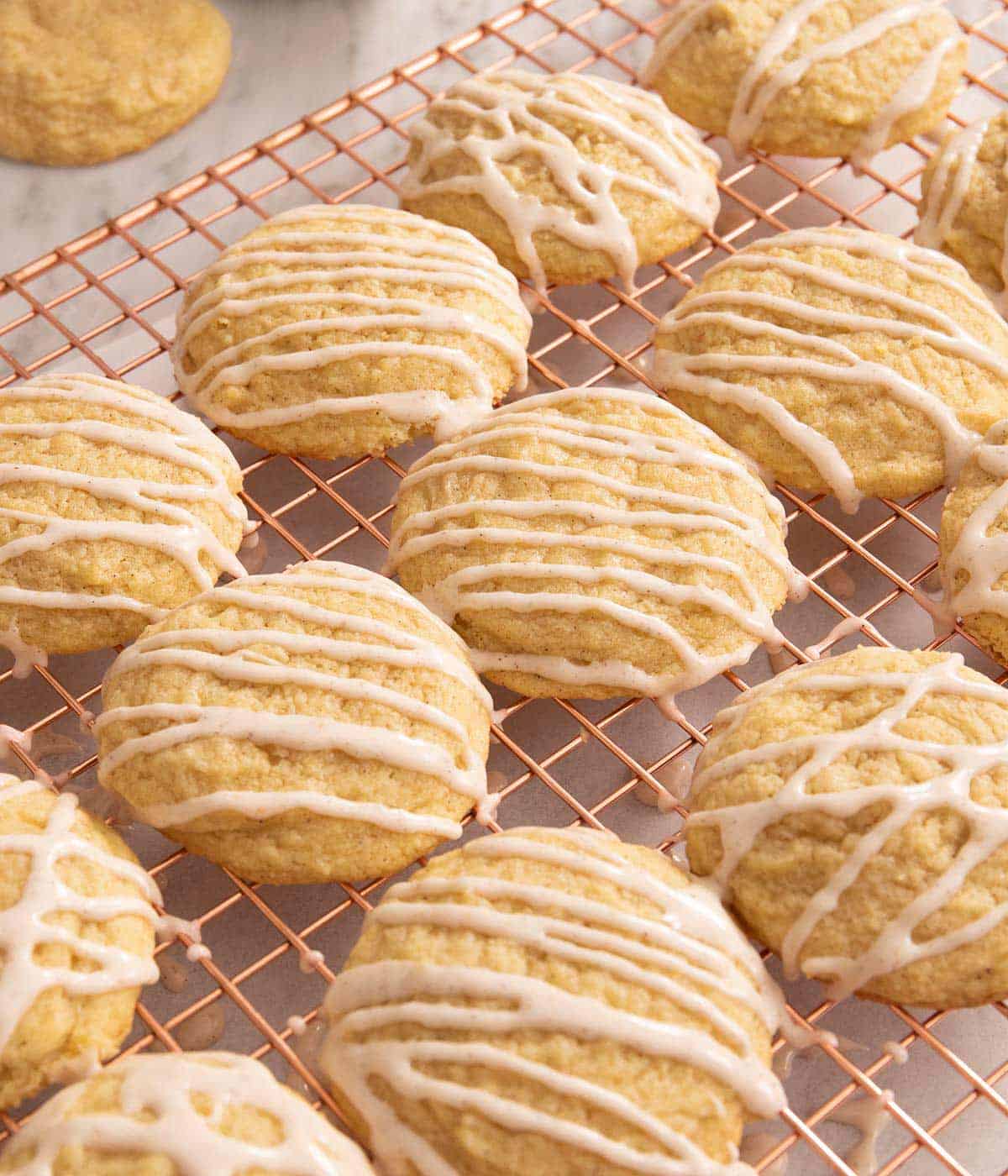 A close up of eggnog cookies on a cooling rack