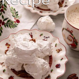 Pinterest graphic of a plate of divinity candy with pecans around it. Another plate and mug of cocoa behind it.