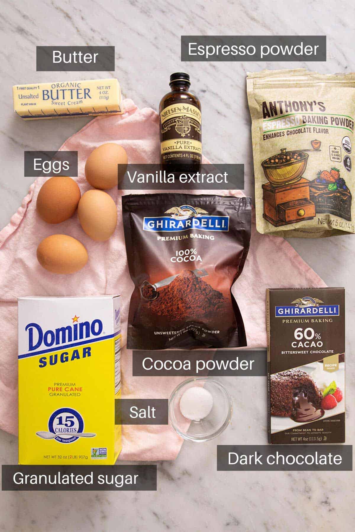 An overhead shot of all the ingredients you need to make flourless chocolate cake