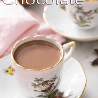 A pinterest graphic of a mug of hot chocolate.