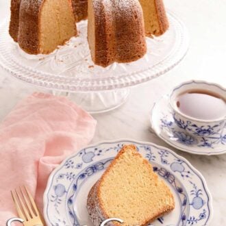 Pinterest graphic of a sour cream pound cake on a cake stand next to a slice and a cup of tea.