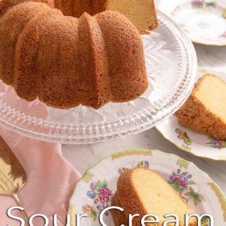 Pinterest graphic of a sour cream pound cake on a cake stand with slices cut out and placed on plates.