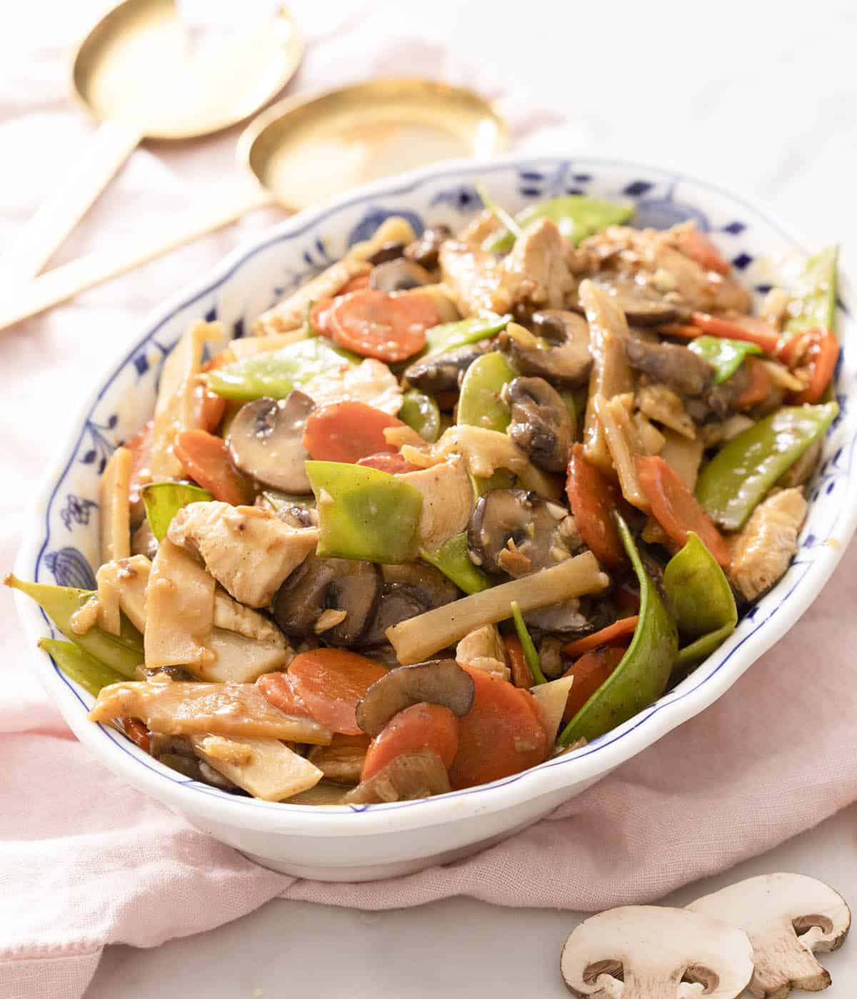 An oval platter of moo goo gai pan.