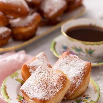 Pinterest graphic of 3 beignets on a plate.