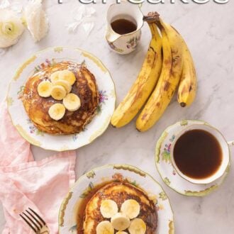 A pinterest graphic of two plates of banana pancakes with bananas, coffee, and maple syrup scattered around.